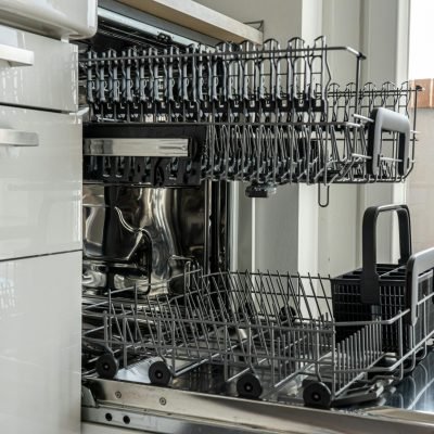 pexels photo 3829560 3829560 Open and empty dishwasher in a sunlit modern kitchen ready for use.